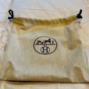 Hermes cloth drawstring bag, classic chevron pattern with brown whole string.